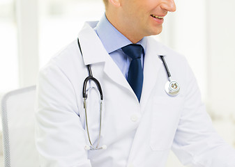 Image showing close up of male doctor at office in hospital