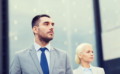 Image showing close up of serious businessmen