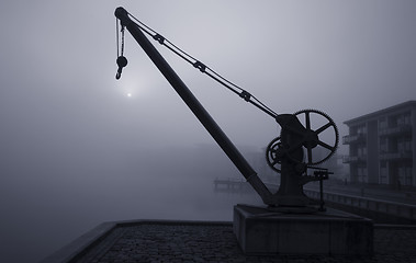 Image showing Crane a foggy morning