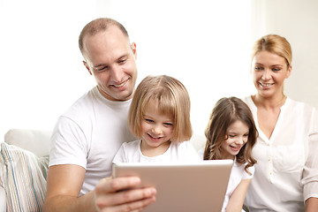 Image showing happy family with tablet pc computers at home