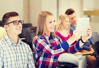 Image showing group of smiling students with tablet pc