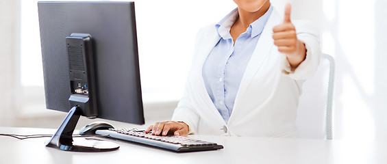 Image showing african businesswoman with computer in office