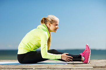 Image showing woman doing sports outdoors