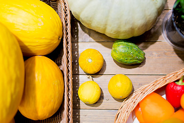 Image showing vegetables in baskets on table at market or farm