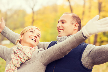 Image showing smiling couple in autumn park