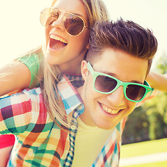 Image showing smiling couple having fun in park