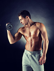 Image showing young man with dumbbell