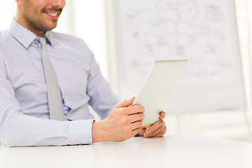 Image showing close up of businessman hands with tablet pc