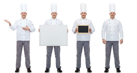 Image showing happy male chef cook holding blank menu board