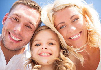 Image showing happy family with blue sky