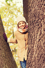 Image showing smiling little girl autumn in park