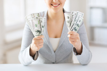 Image showing close up of woman hands holding us dollar money