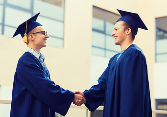 Image showing smiling students in mortarboards