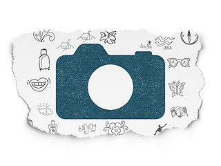 Image showing Tourism concept: Photo Camera on Torn Paper background