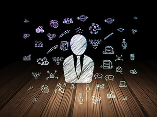 Image showing Business concept: Business Man in grunge dark room