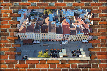 Image showing brick wall and view to the house-tops in Lvov city