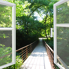 Image showing opened window to the bridge across ravine