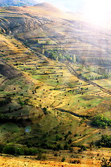 Image showing sun beautiful light over the hills