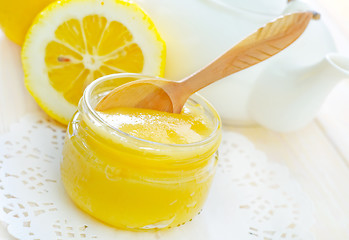 Image showing honey and lemons