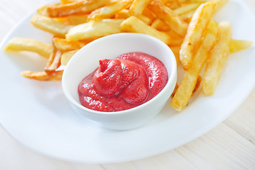 Image showing potato fries with sauce