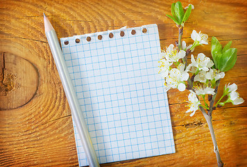 Image showing flowers on wooden background