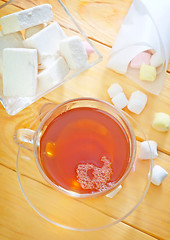 Image showing Fresh tea with candy