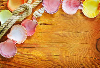 Image showing shells on wooden background