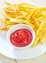 Image showing potato fries with sauce