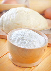 Image showing Flour in the wooden bowl