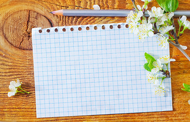 Image showing flowers on wooden background