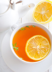 Image showing Fresh tea with lemon in the white cup