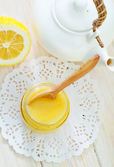 Image showing honey and lemons