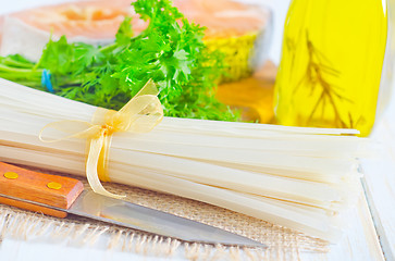 Image showing raw rice noodles and raw salmon