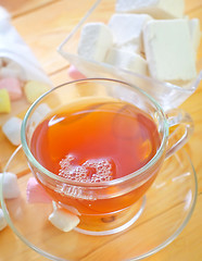 Image showing Fresh tea with candy