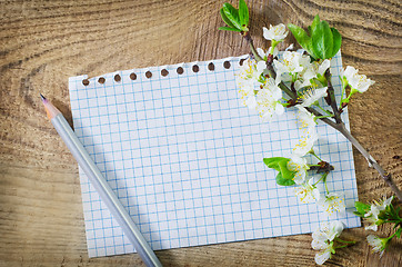 Image showing flowers on wooden background