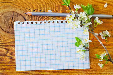 Image showing flowers on wooden background