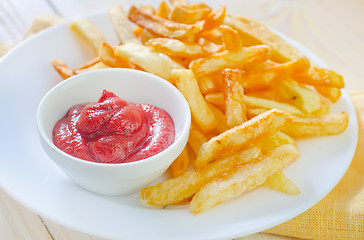 Image showing potato fries with sauce