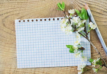 Image showing flowers on wooden background