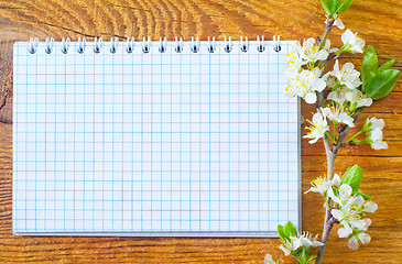 Image showing flowers on wooden background