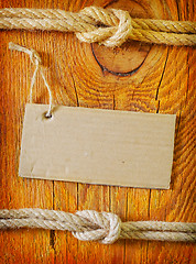 Image showing rope and blank on wooden background