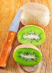 Image showing fresh kiwi on the wooden board