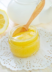 Image showing honey and lemons