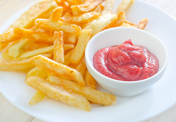 Image showing potato fries with sauce