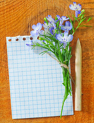 Image showing note and flowers