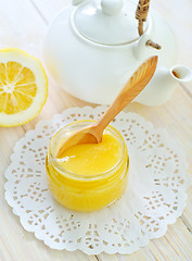 Image showing honey and lemons