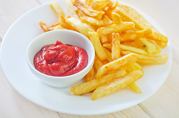 Image showing potato fries with sauce