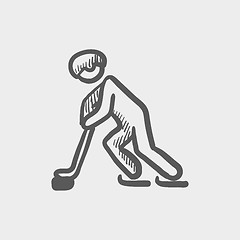 Image showing Hockey player pushing the puck sketch icon