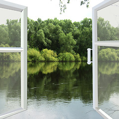 Image showing opened window to the spring river