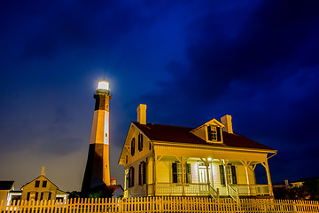 Image showing tybee island beach lighthouse with thunder and lightning