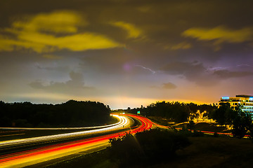 Image showing thunder and lightning storm weather during evening traffic commu